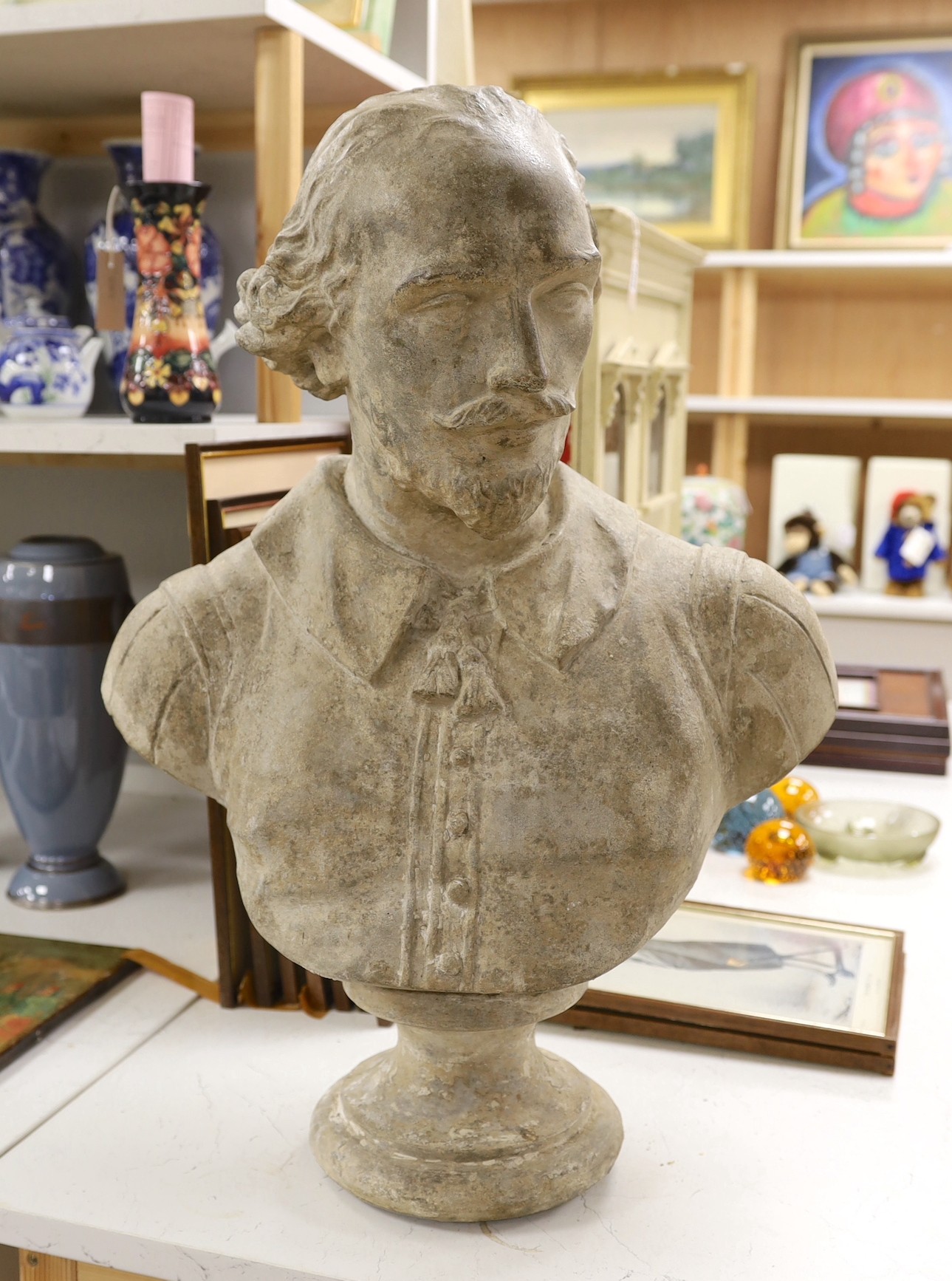 A reconstituted stone bust of William Shakespeare, 68cm high